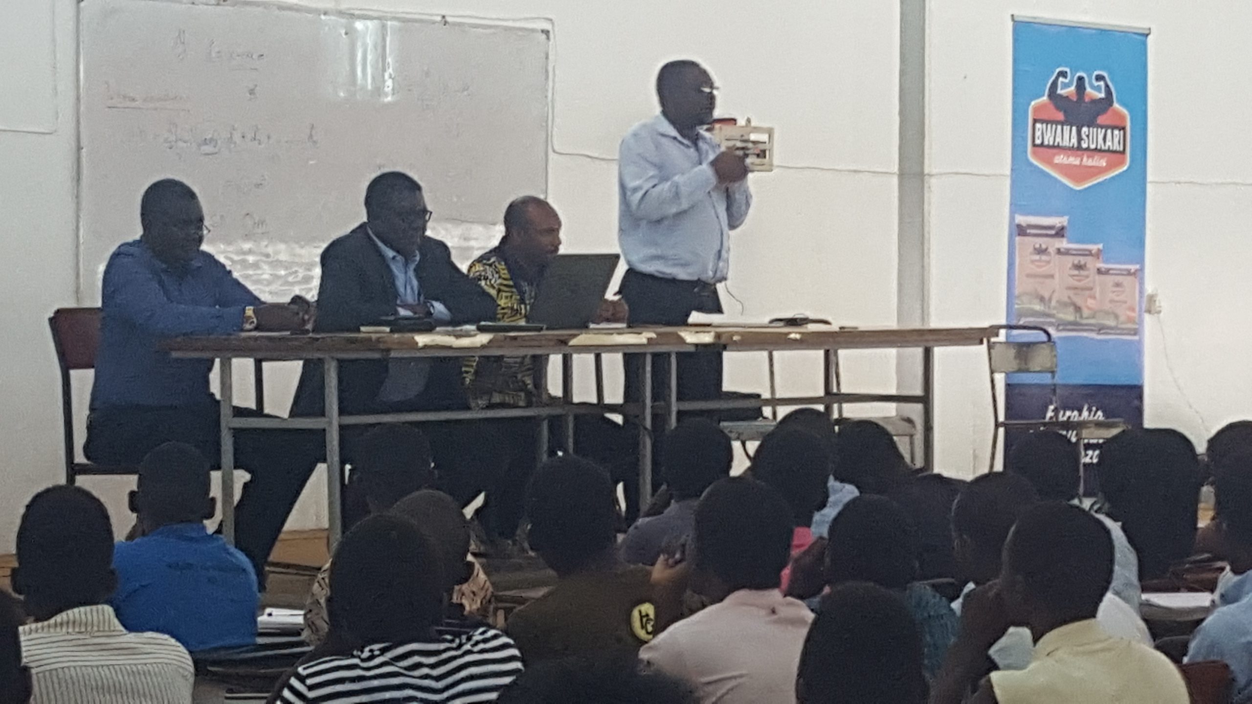 A represenative from Kilombero Sugar Company talking to students under College of Agriculture  on opportunities present in their company