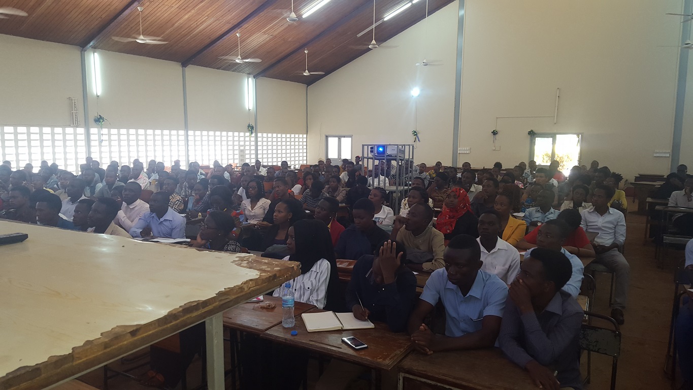 Students under College of Agriculture listening to a representatives from Kilombero Sugar Company